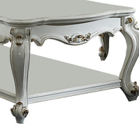 Traditional Style Wooden Coffee Table with Polyresin Carvings and Bottom Shelf, White BM196693