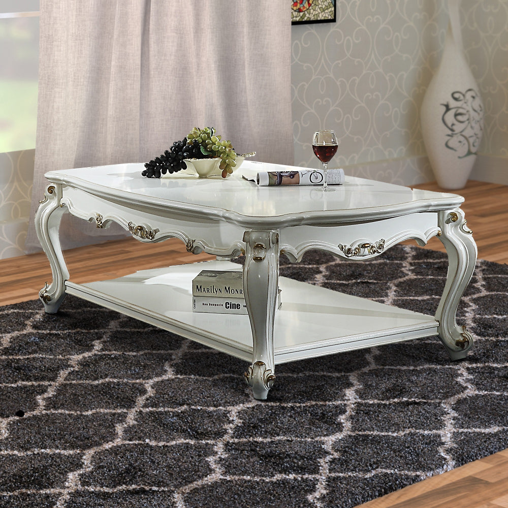 Traditional Style Wooden Coffee Table with Polyresin Carvings and Bottom Shelf, White BM196693