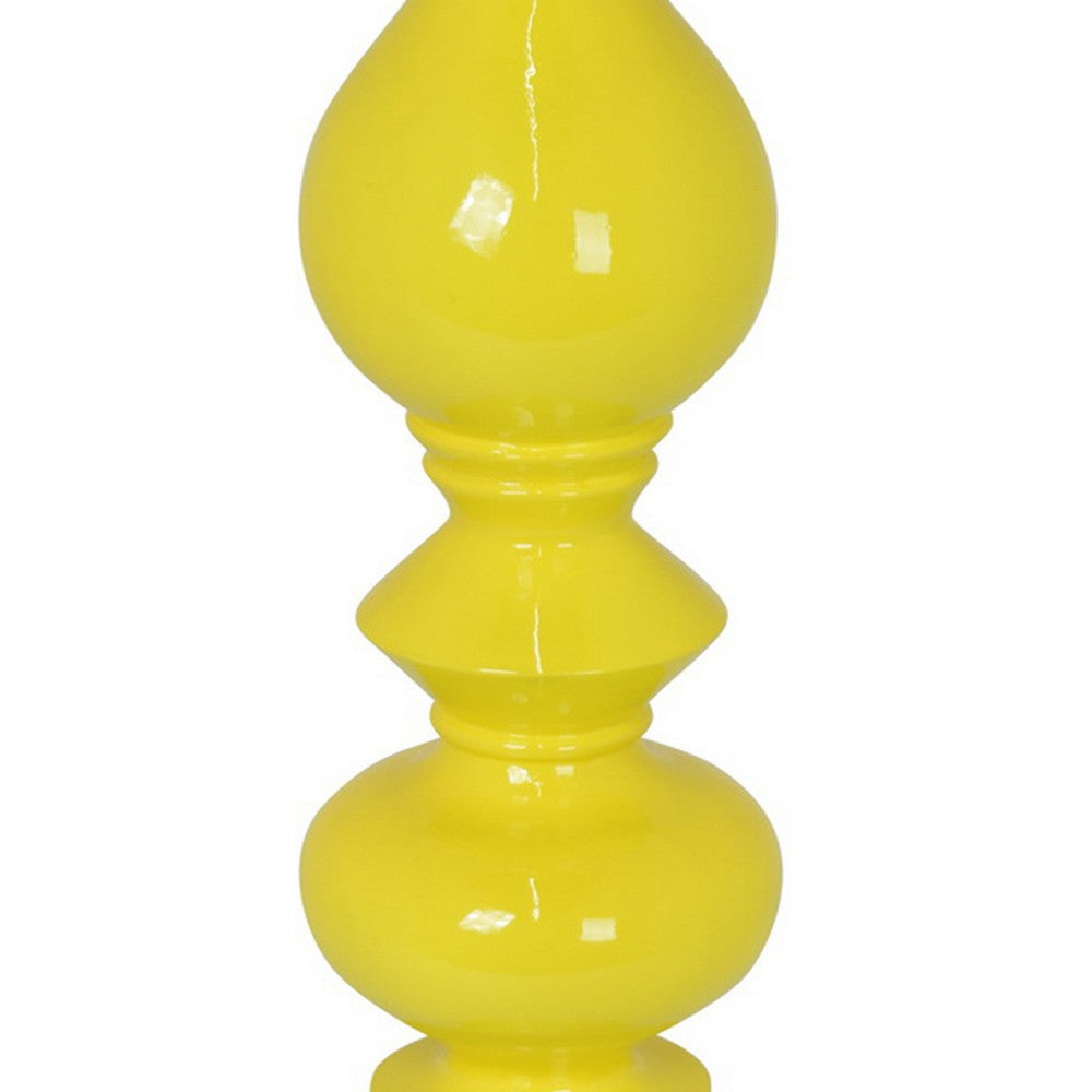 Naze Tabletop Candle Holder with Turned Accents, 23 Inch Yellow Resin -BM324536