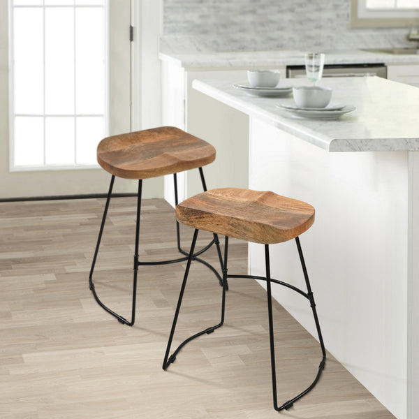Tiva 24 Inch Handcrafted Backless Counter Height Stool, Brown Mango Wood Saddle Seat, Black Metal Base - UPT-294096
