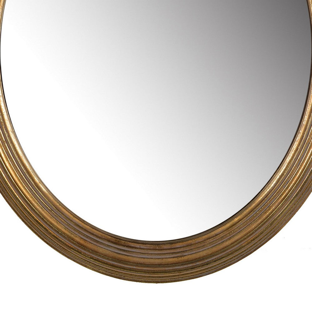 26 Inch Wall Accent Mirror with Ornate Polyresin Floral Crest, Antique Gold - BM286122