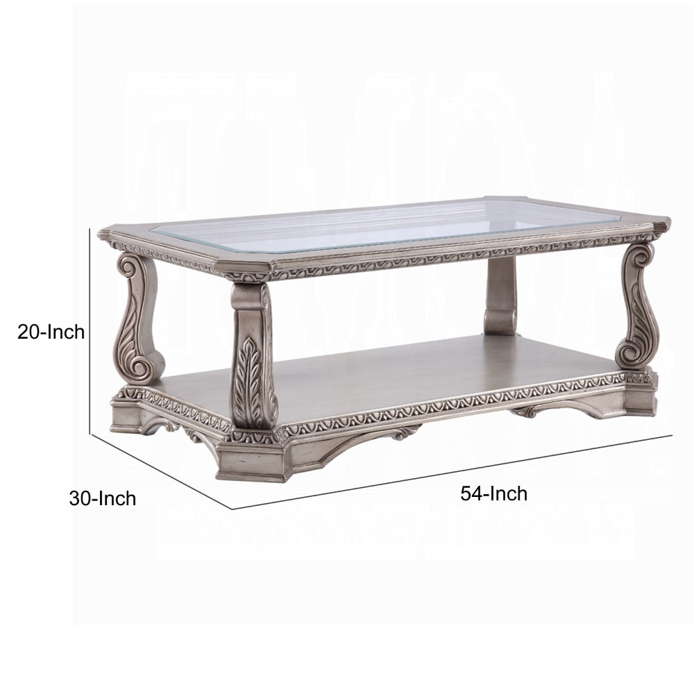 Wooden Coffee Table with Inserted Glass Top and Scrolled Legs, Silver and Clear  - BM194278