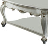 Traditional Style Wooden Coffee Table with Polyresin Carvings and Bottom Shelf, White BM196693