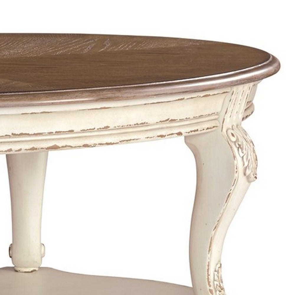 Two Tone Oval Cocktail Table with Bottom Shelf, Antique White and Brown - BM227591