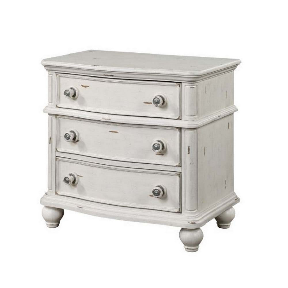 Spica 30 Inch Wood Nightstand, 3 Drawers, Turned Legs, Antique White Finish - BM296864