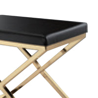 Myra 21 Inch Accent Stool, Black Faux Leather, Gold Finished Cross Legs - BM312275