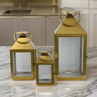 Davi Set of 3 Decorative Lanterns, Curved Handles, Glass Panel, Gold Metal - BM315627