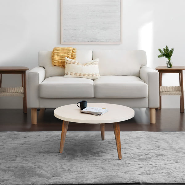 24 Inch Modern Coffee Table, Round Off White MDF Top, Tapered Brown Mango Wood Legs - UPT-225282