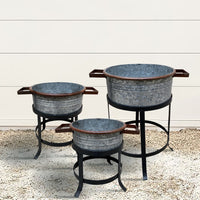 21, 18, and 16 Inch 3 Piece Round Tub Metal Planter Set with Stand in Galvanized Gray and Black Iron - UPT-271316