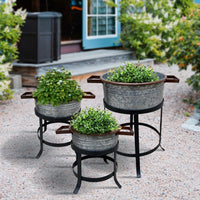 21, 18, and 16 Inch 3 Piece Round Tub Metal Planter Set with Stand in Galvanized Gray and Black Iron - UPT-271316
