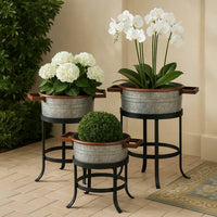 21, 18, and 16 Inch 3 Piece Round Tub Metal Planter Set with Stand in Galvanized Gray and Black Iron - UPT-271316