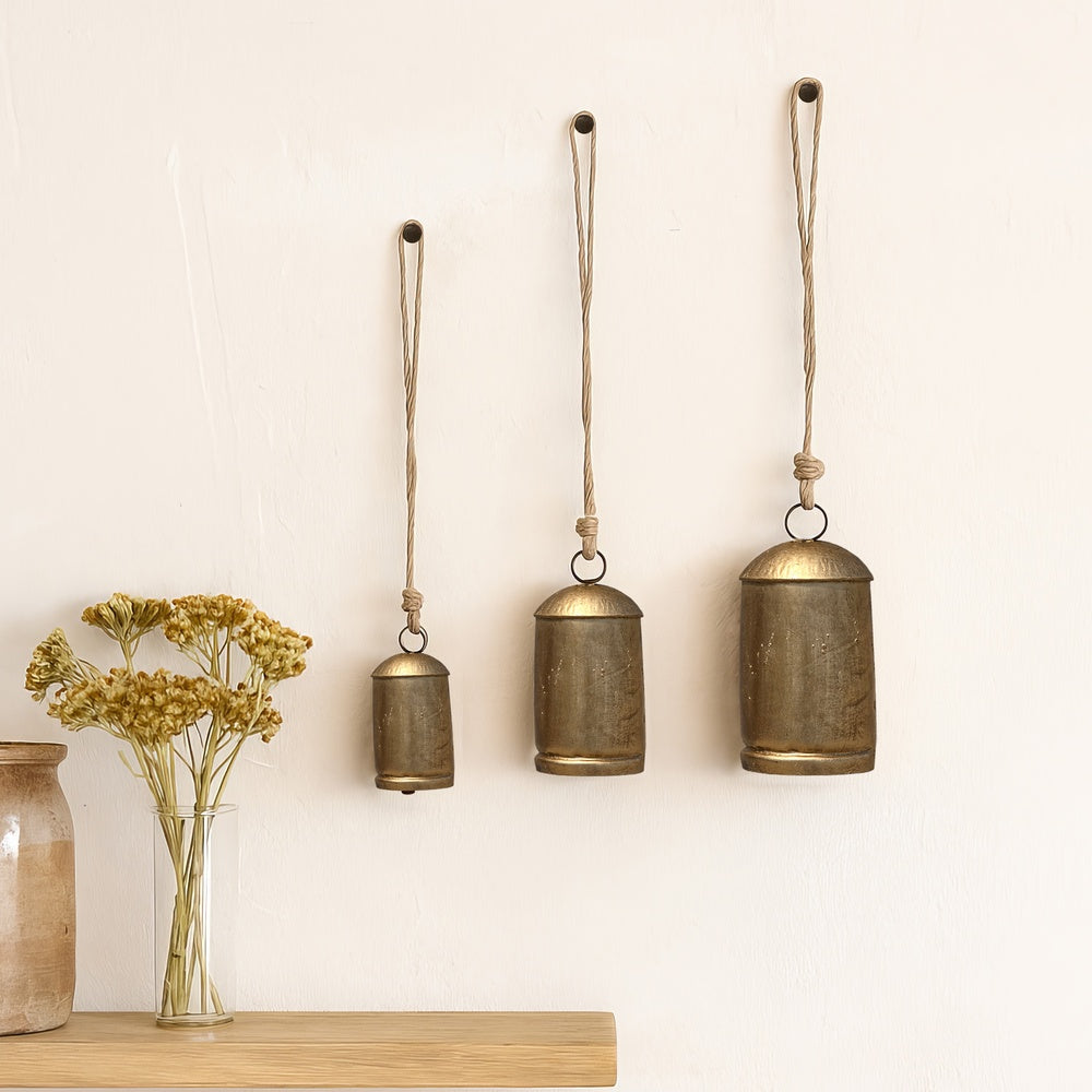 Zaira Decorative Iron Cow Bells Set of 3 | Cylindrical | Antique Gold Finish| Jute Hanging Rope | 20, 15, 12 Inches - UPT-332559