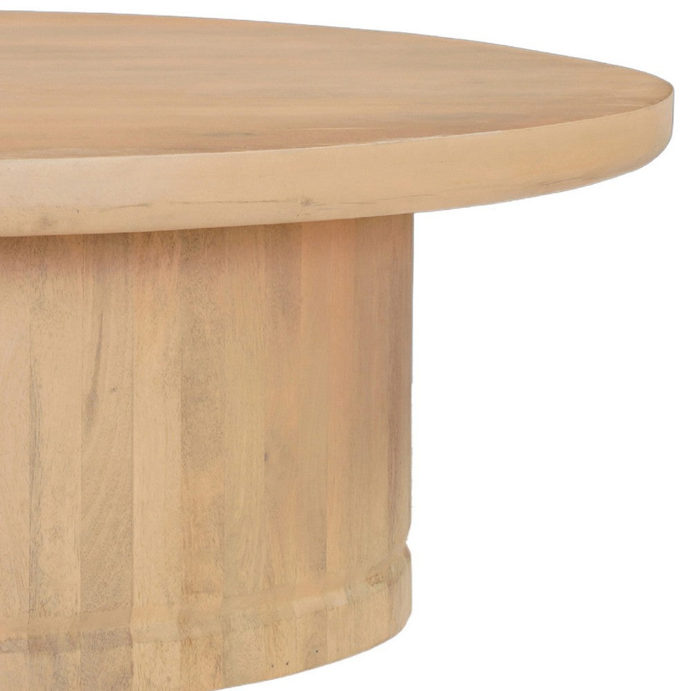 Bela Coffee Table | 47 Inch Round Top | Handcrafted Beige Mango Wood Pedestal Base - UPT-336459
