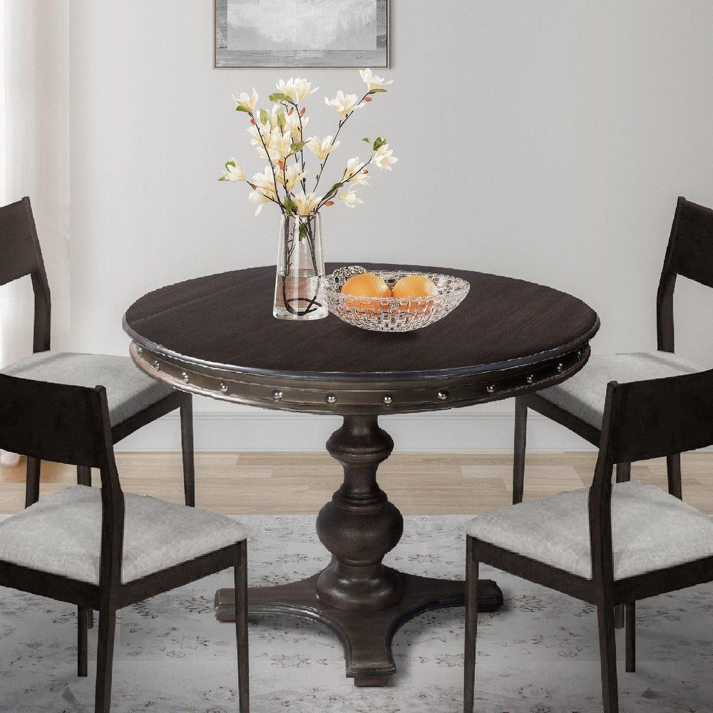 42 Inch Handcrafted Round Mango Wood Dining Table, Subtle Rivet Accents, Turned Pedestal Base, Dark Brown - UPT-215752